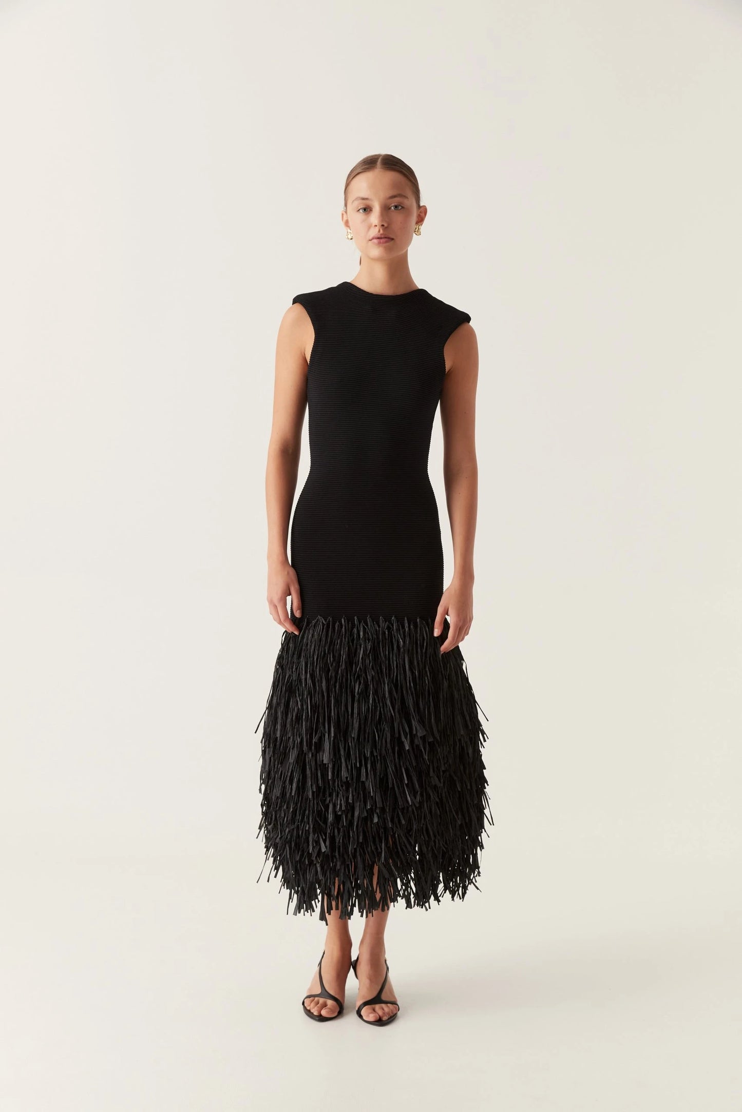Aje-Rushes-Knit-Midi-Dress-1-scaled.webp